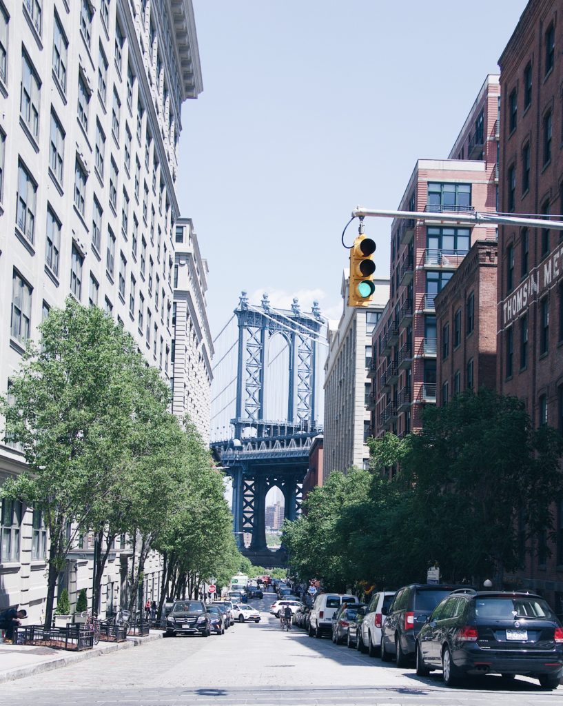 famous street view of a bridge in Dumbo Brooklyn, NYC in May